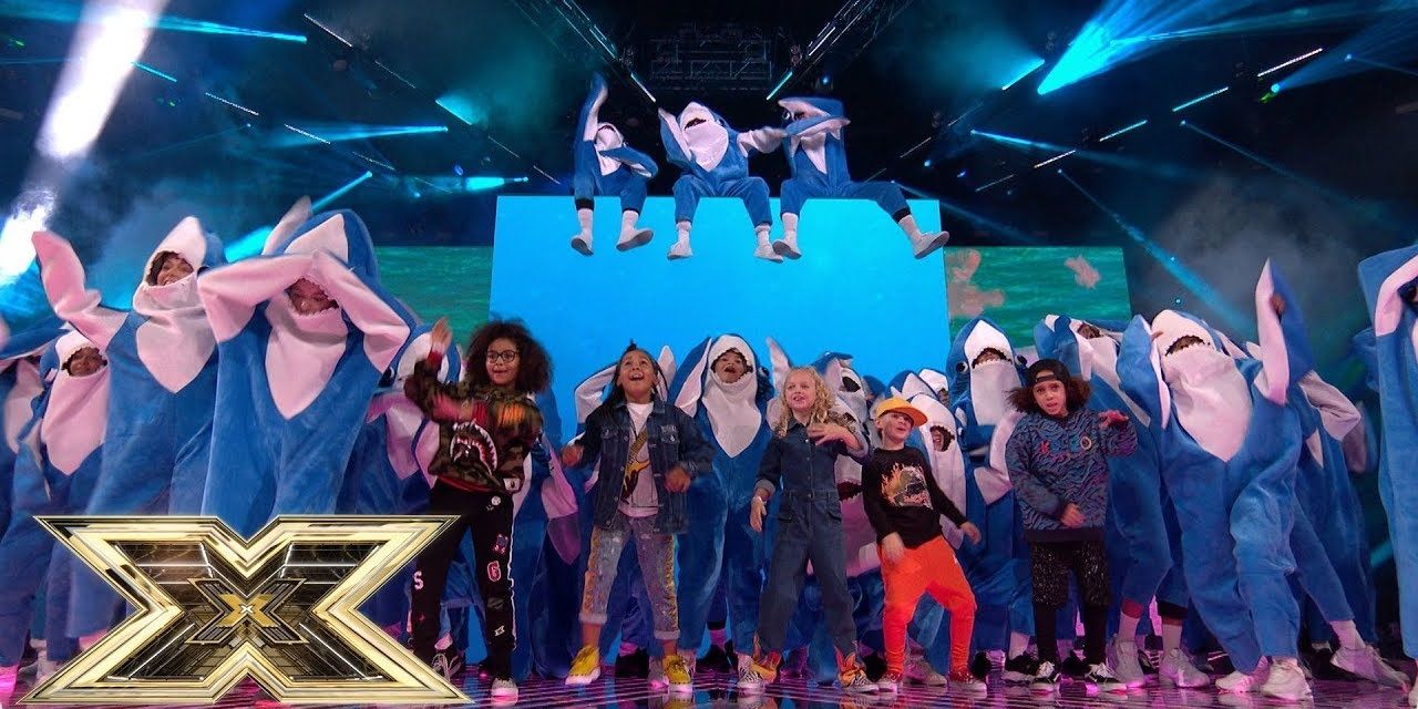 X Factor Kids singing on stage
