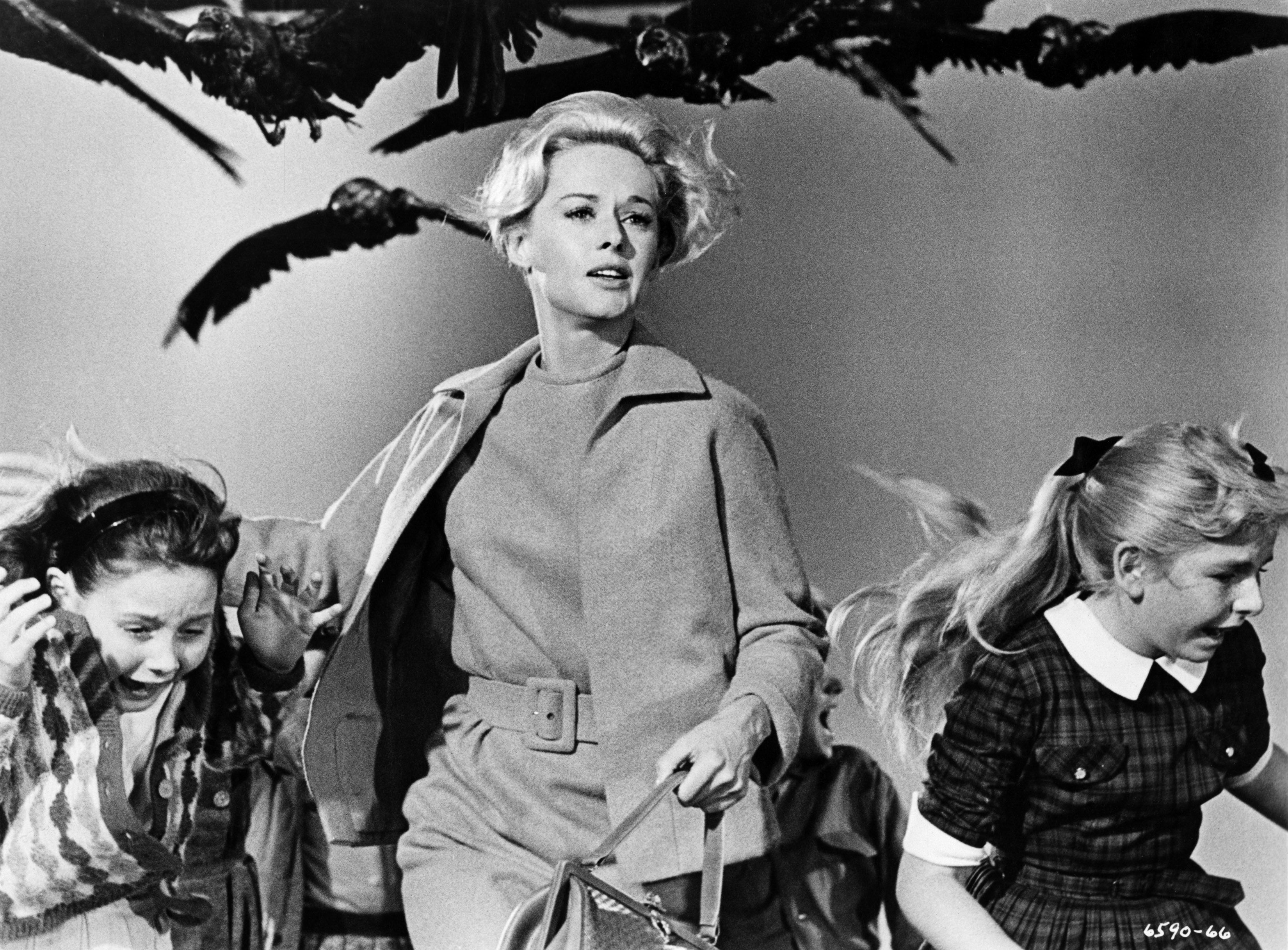 Tippi Hedren and children in a scene from THE BIRDS, 1963.