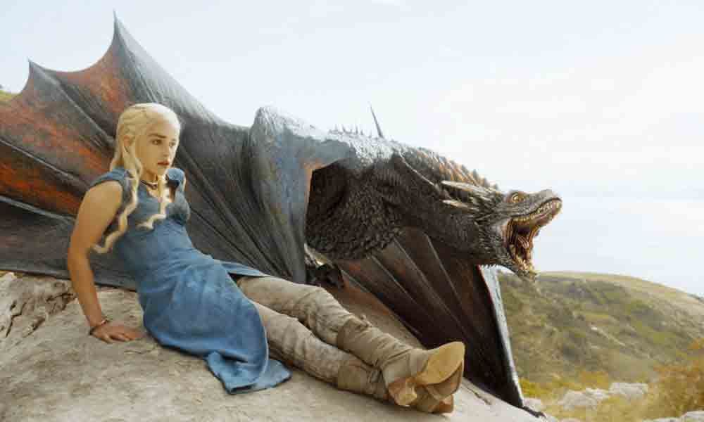 Emilia Clarke as Daenerys Targaryen with her dragon in 'Game of Thrones'