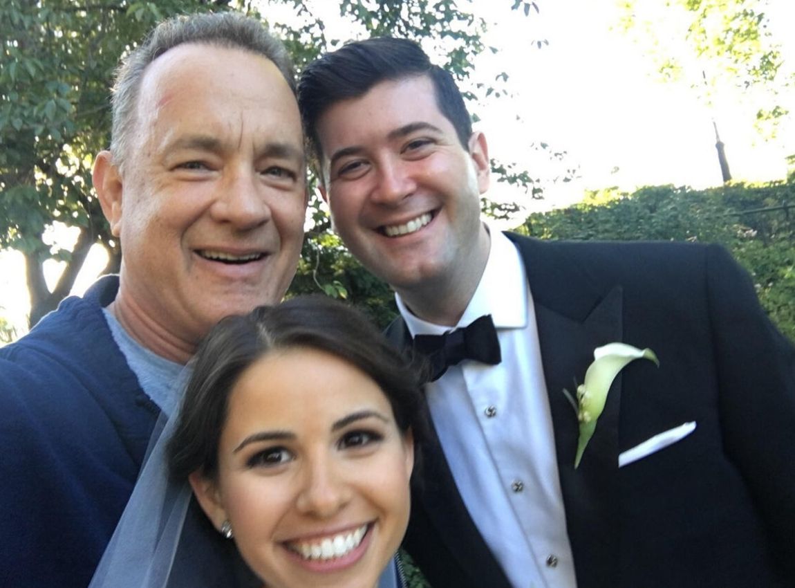tom hanks taking selfie with bride and groom