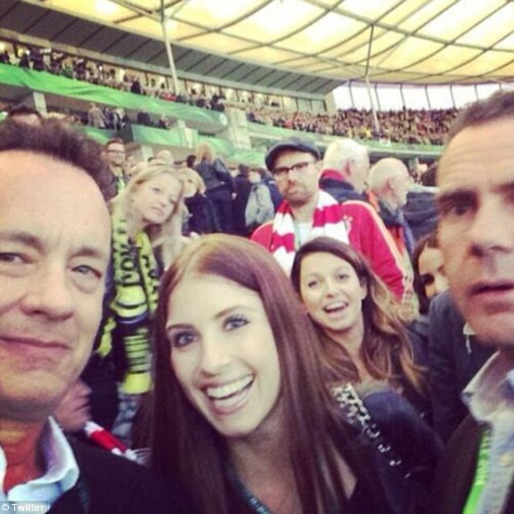 tom hanks with fans at game