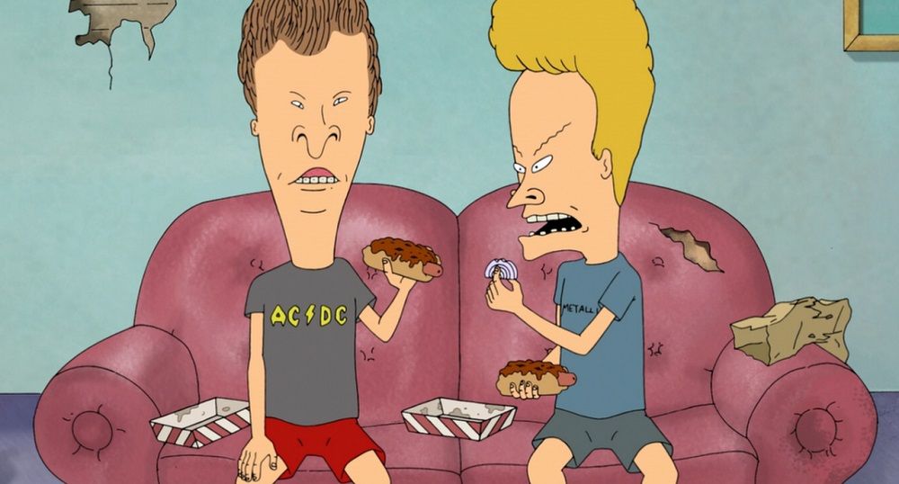 Beavis and Butt-head eat snacks on the couch