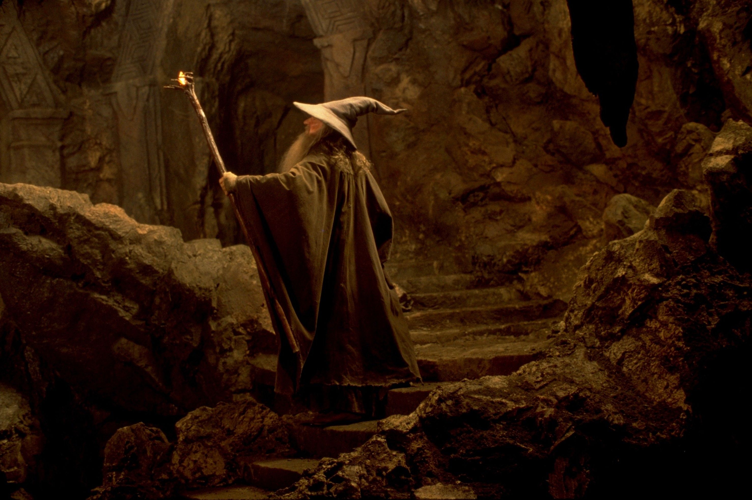 Gandalf leads the fellowship through the Mines of Moria