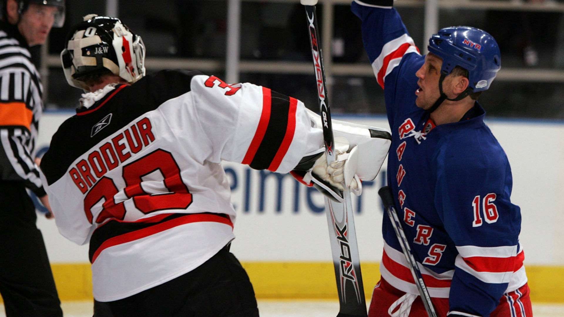 Avery tries to distract Jersey goaltender Martin Brodeur