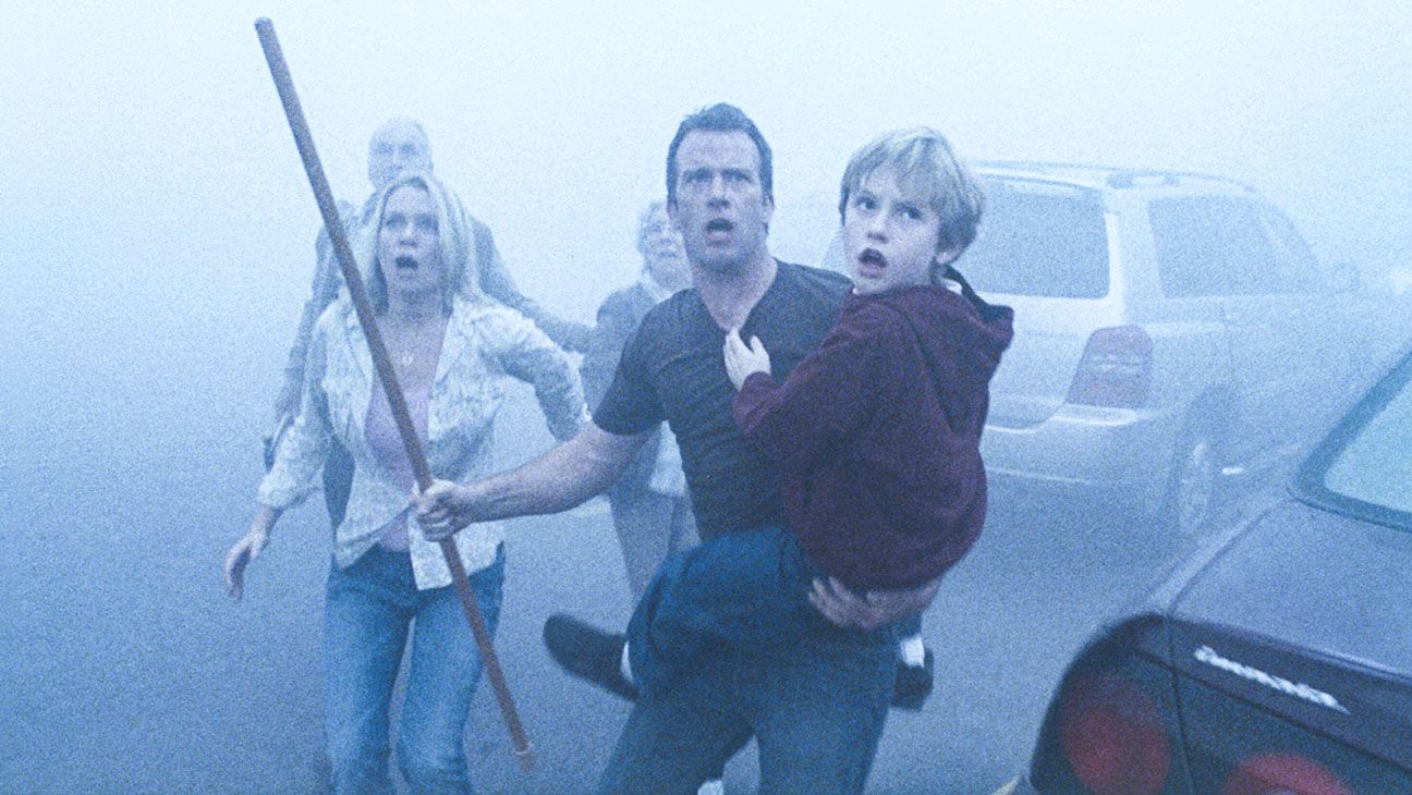 The Mist (2007) Directed by Frank Darabont Shown from left: Laurie Holden, Thomas Jane and Nathan Gamble