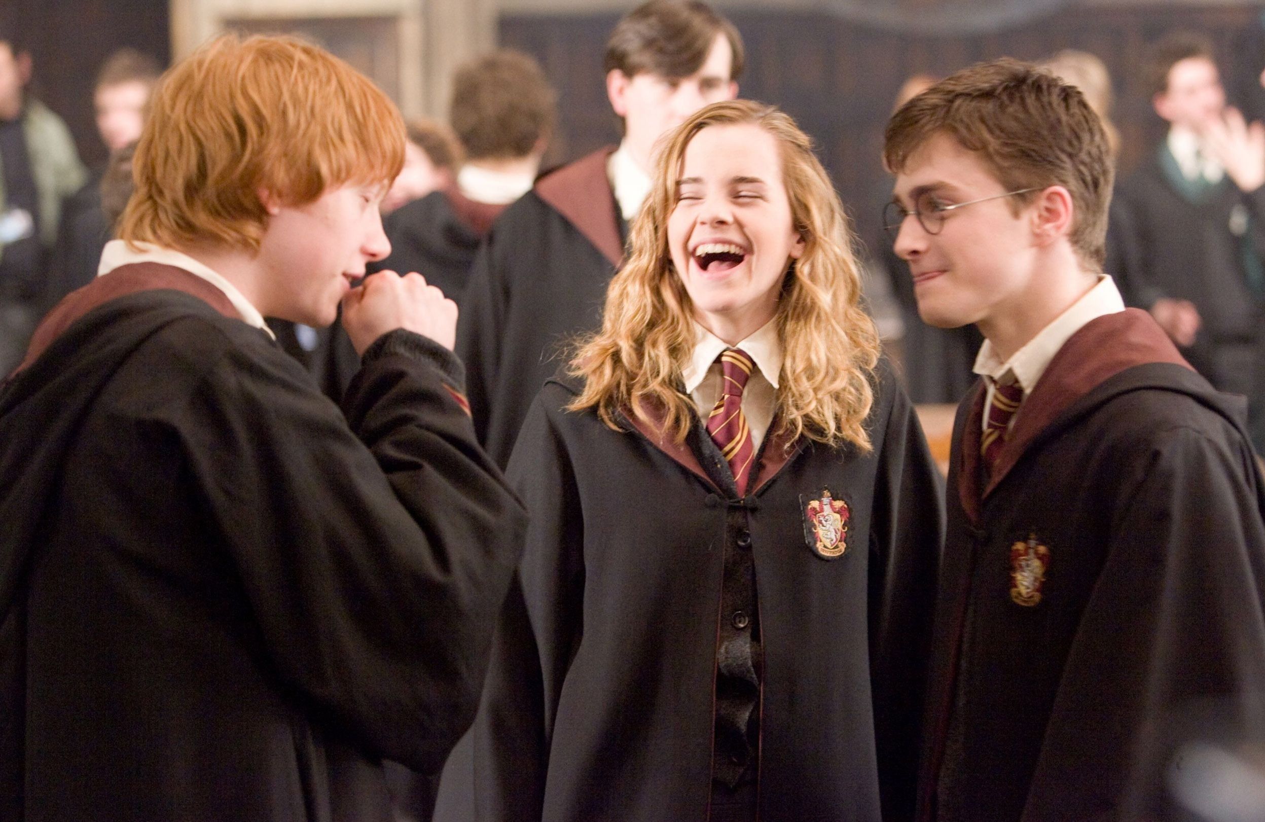Radcliffe, Watson and Grint laughing on Potter set