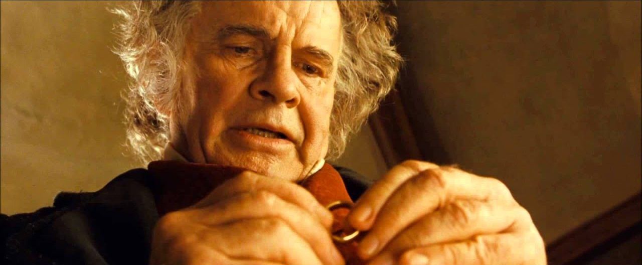 Bilbo holds the ring before giving it up