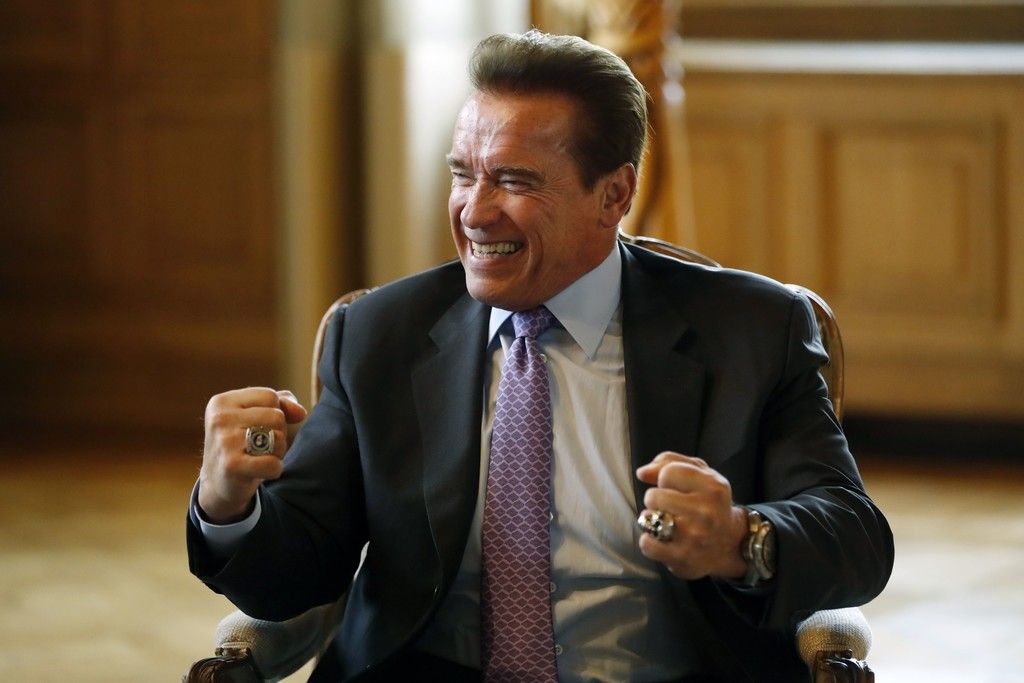 Arnold Schwarzenegger In office laughing