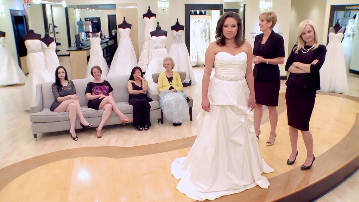 Salina trying on a wedding dress with family on Say Yes To the Dress