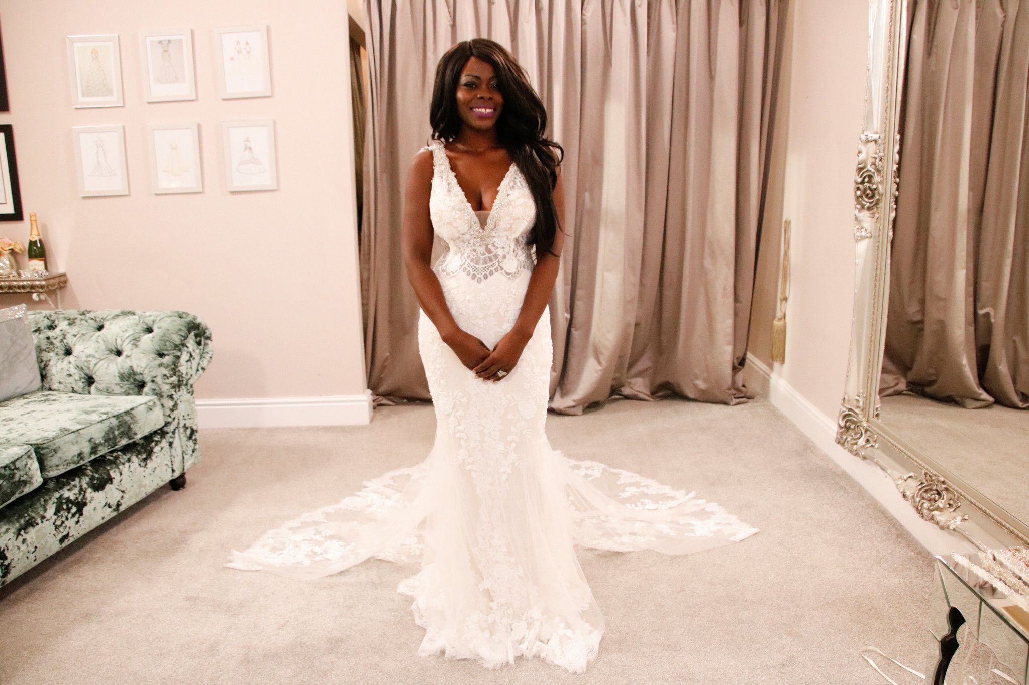 Helen posing in a wedding gown at Kleinfeld's on Say yes To The Dress
