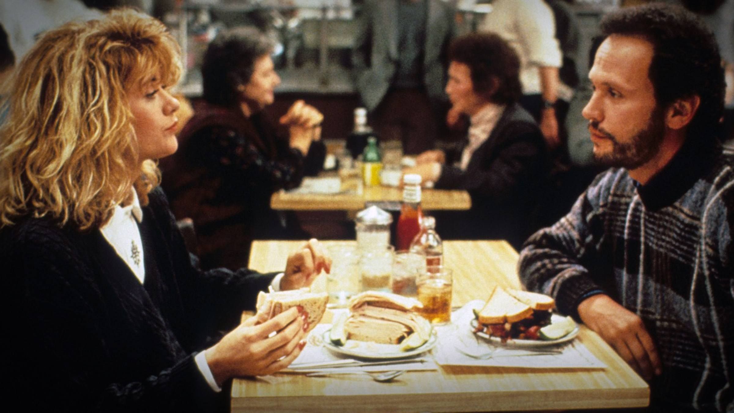 Harry and Sally sitting at the restaurant 
