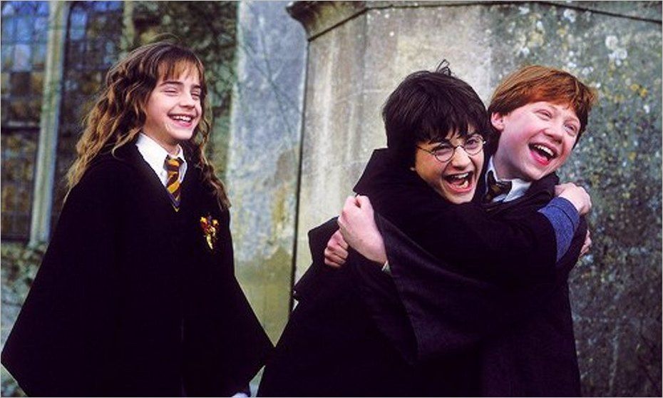Daniel Radcliffe, Emma Watson and Rupert Grint on set