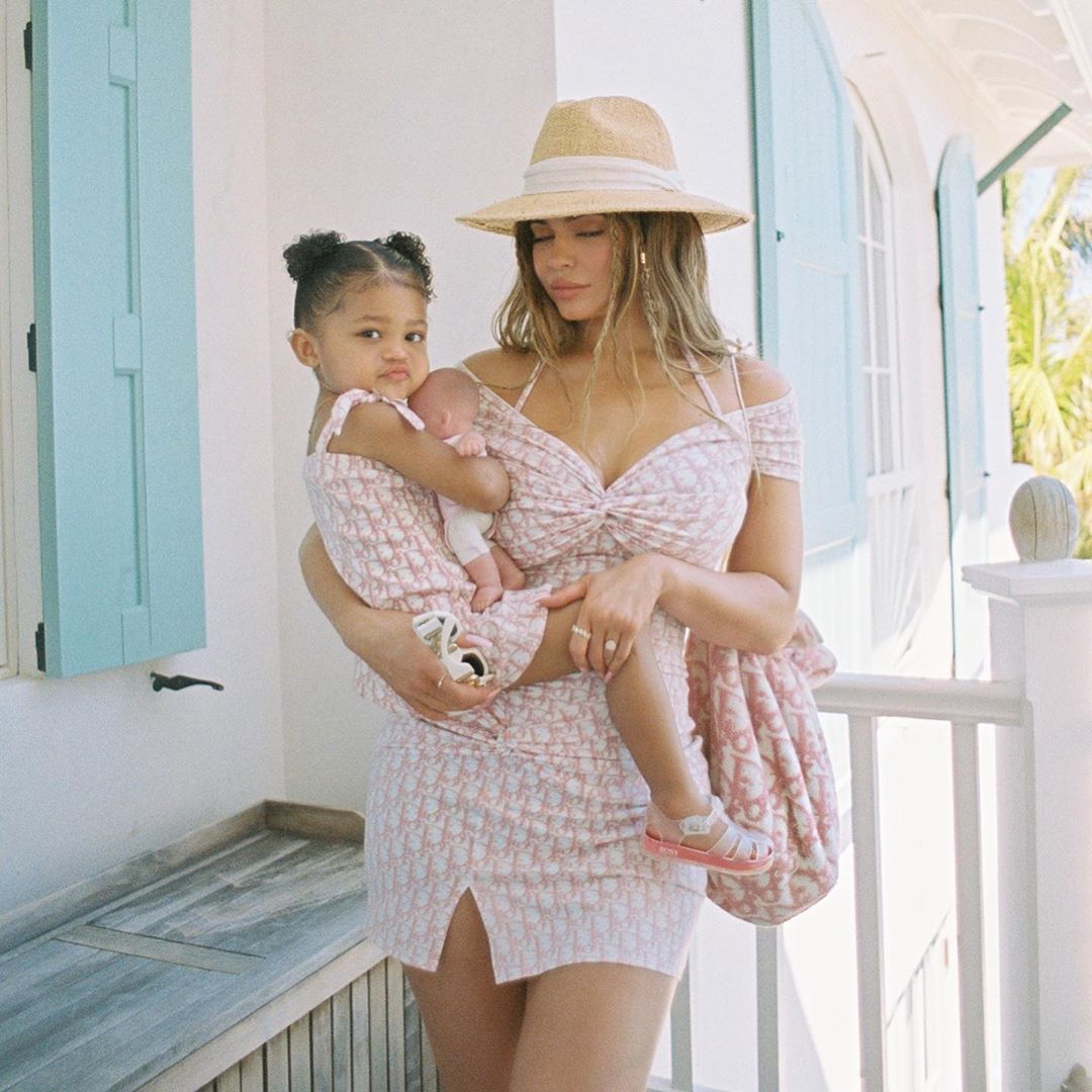 Kylie Jenner posing with daughter on vacation