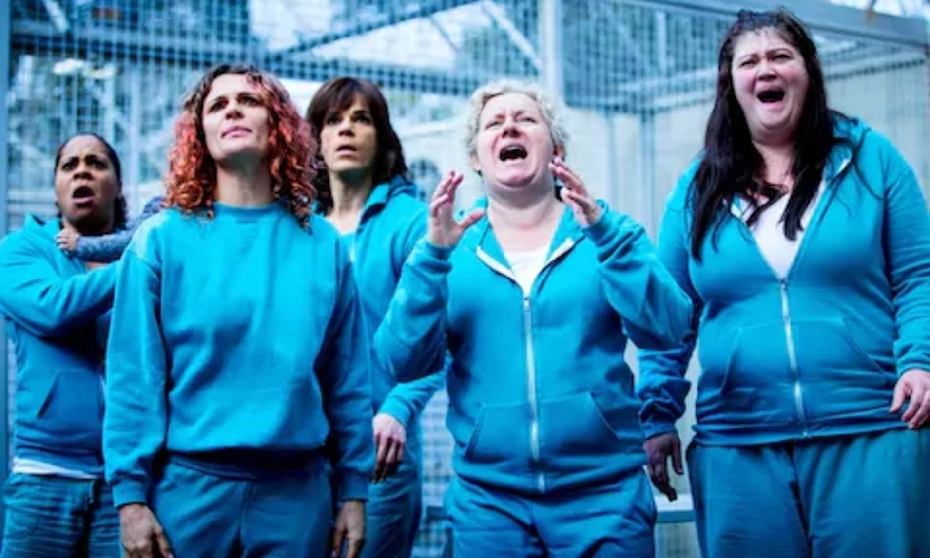 the inmates of wentworth reacting to something offscreen