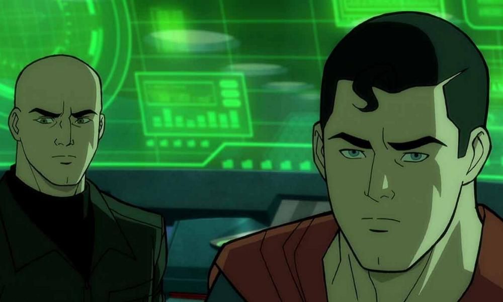 Superman and Lex Luthor in a secret room with a green computer displaying data behind them.