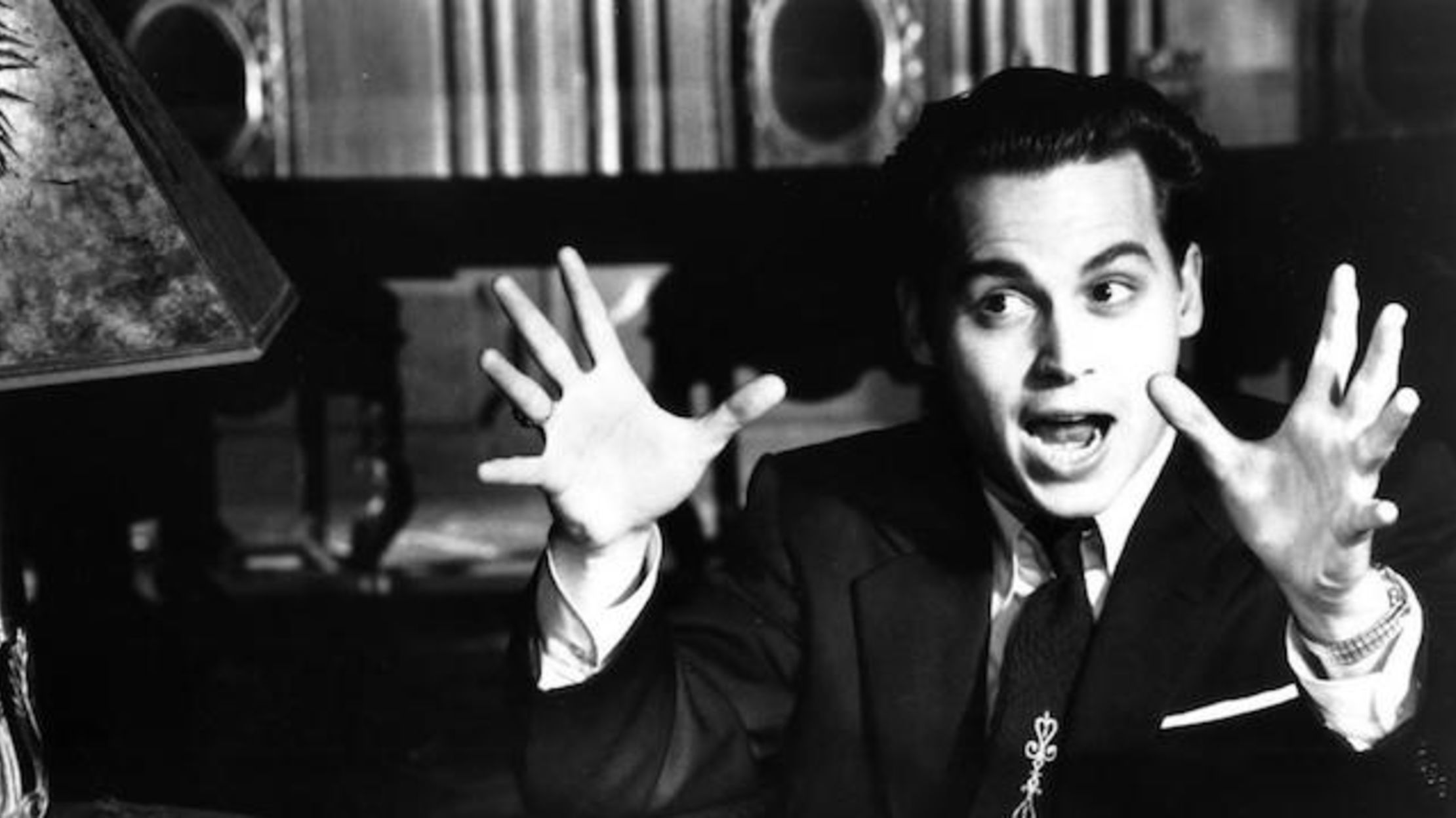 johnny depp waves his hands as ed wood