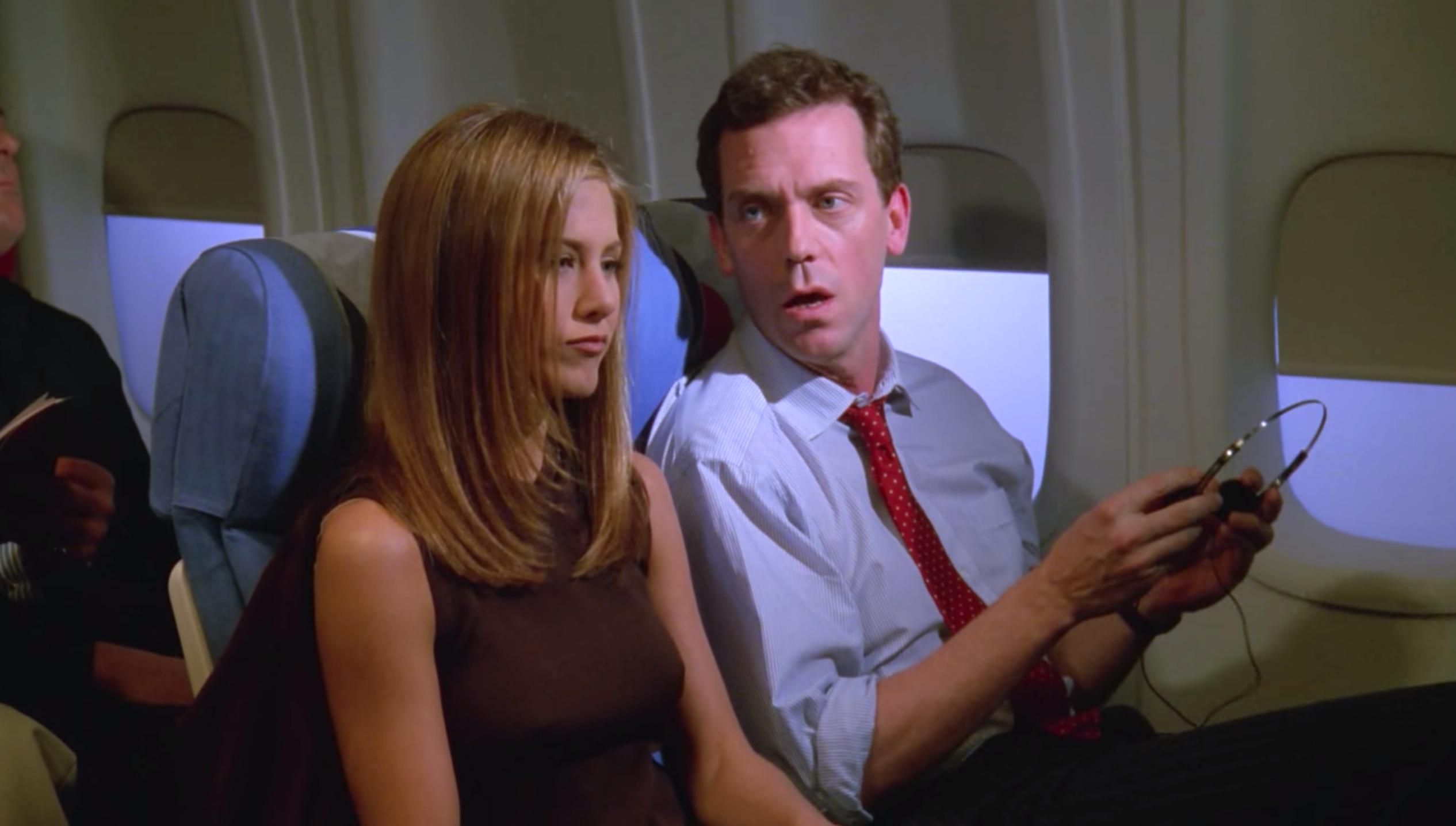 Jennifer Aniston as Rachel Green and Hugh Laurie as an airplane passenger on 'Friends'
