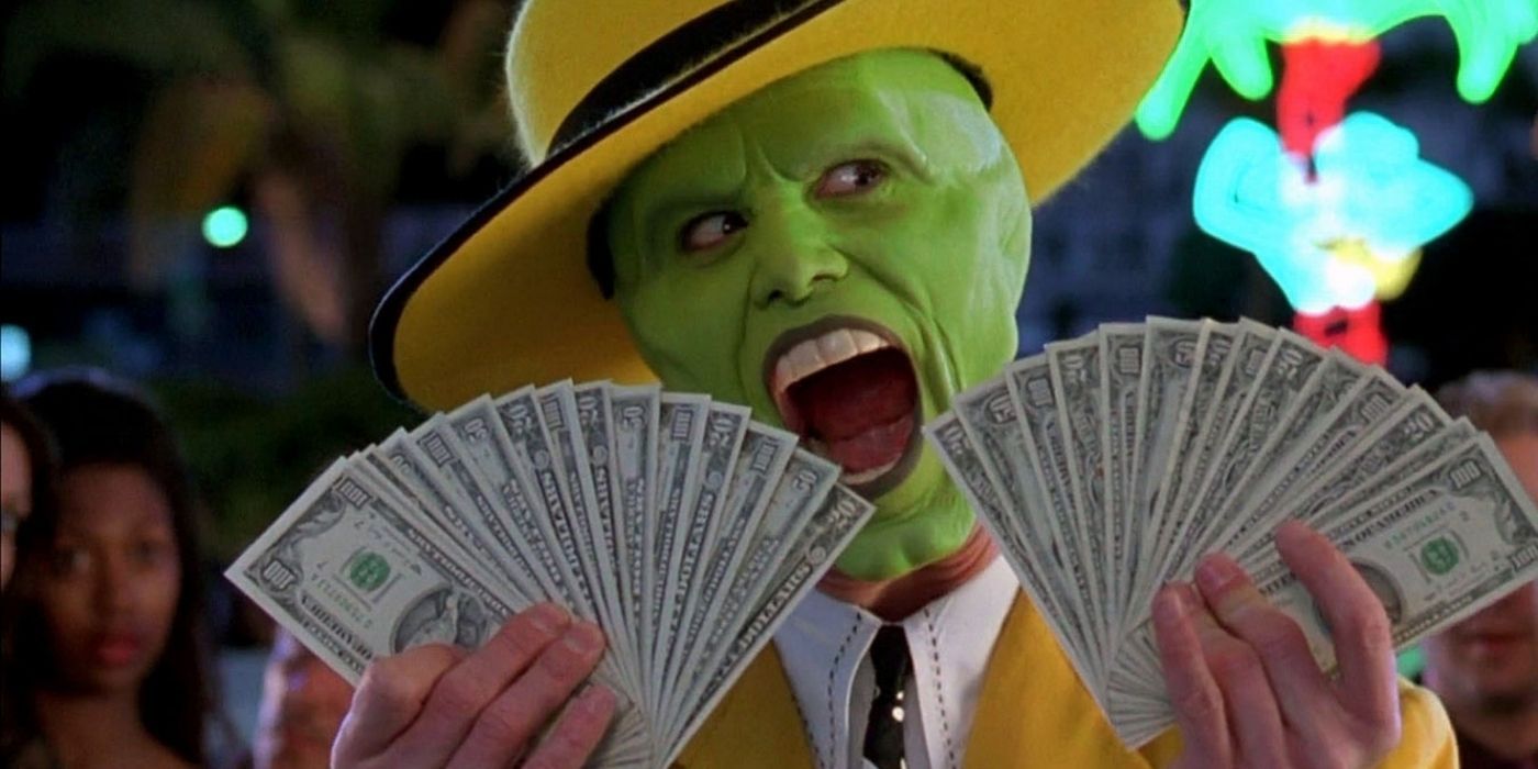Jim Carrey as The Mask holding up money
