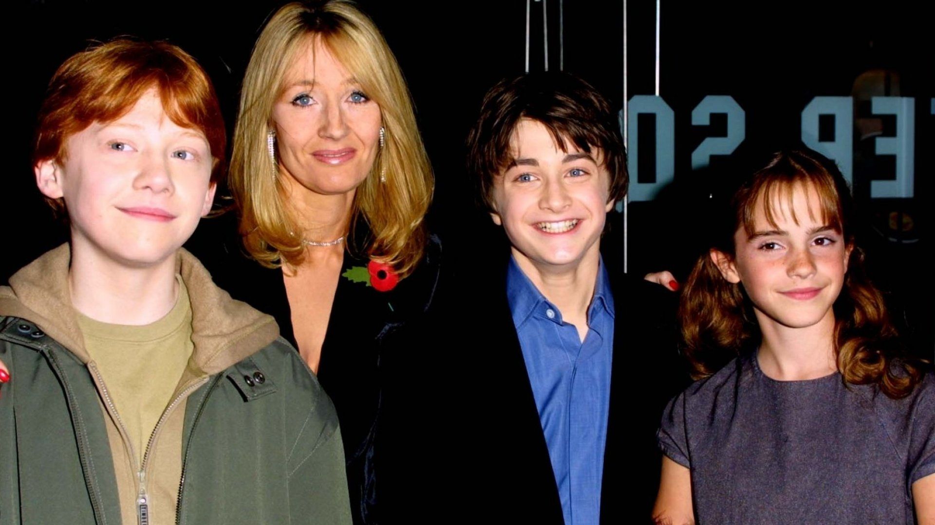 JK Rowling with Rupert Grint, Daniel Radcliffe, and Emma Watson at a 'Harry Potter' premiere