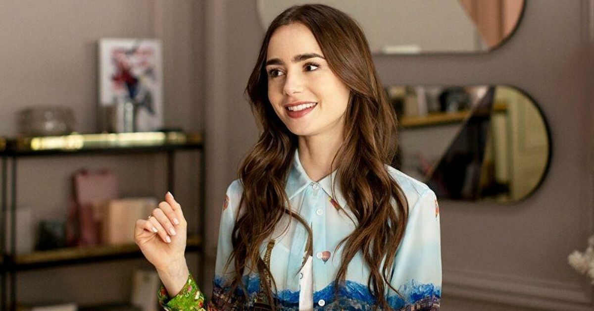 lily collins wears a printed shirt as Emily Cooper in Emily in paris