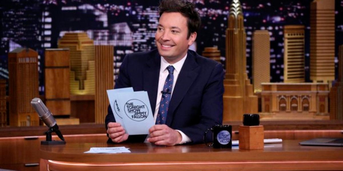 Jimmy Fallon at his desk on The Tonight Show