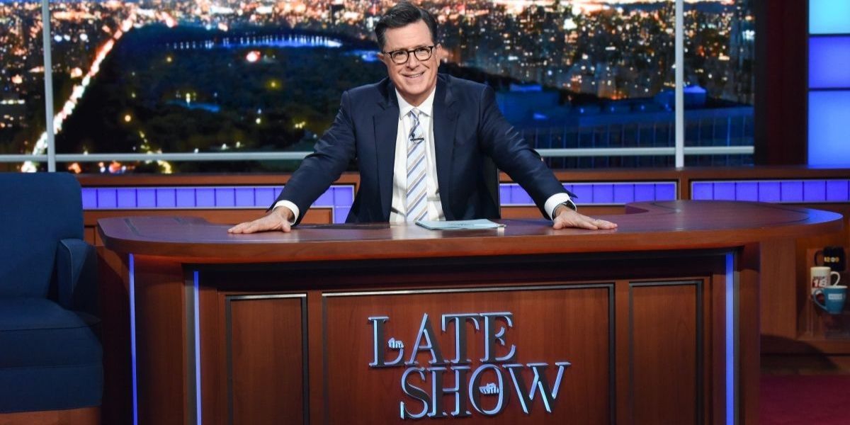 Stephen Colbert at his desk on The Late Show