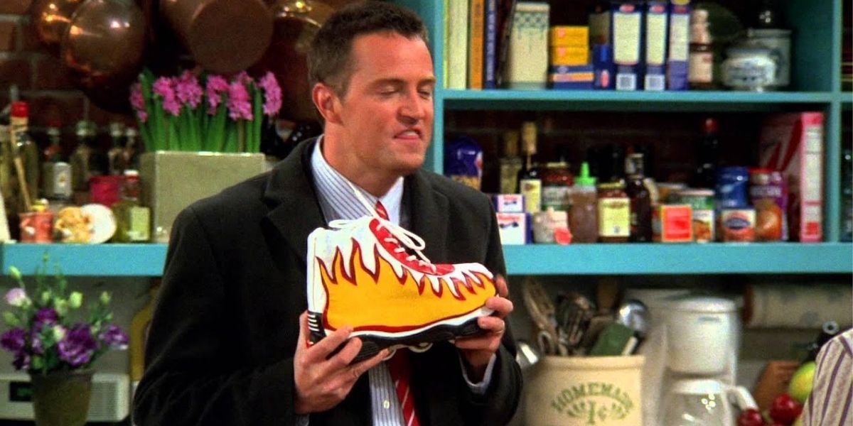 Chandler holding his new shoe design