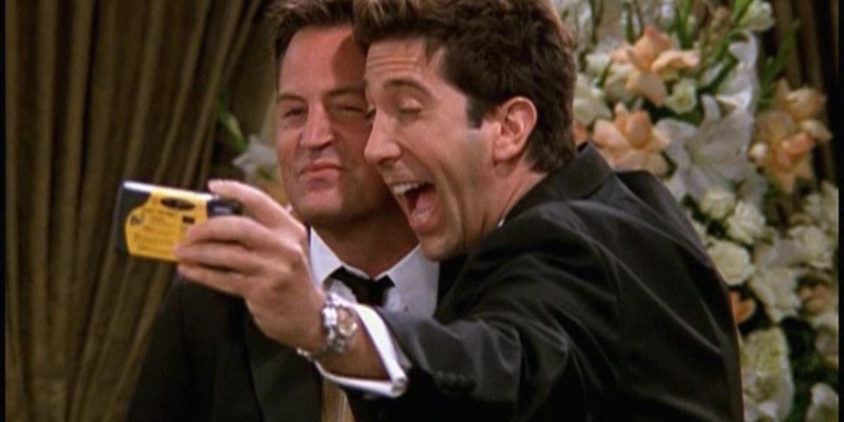 Chandler and Ross taking pictures 