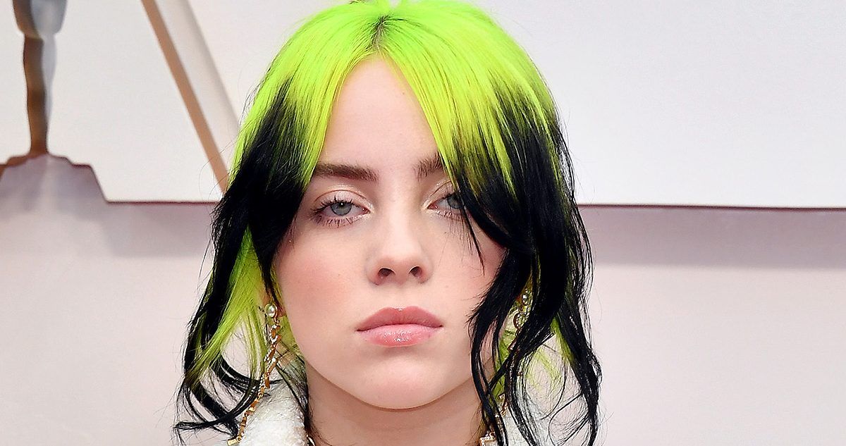 Billie Eilish wearing her iconic neon green hair