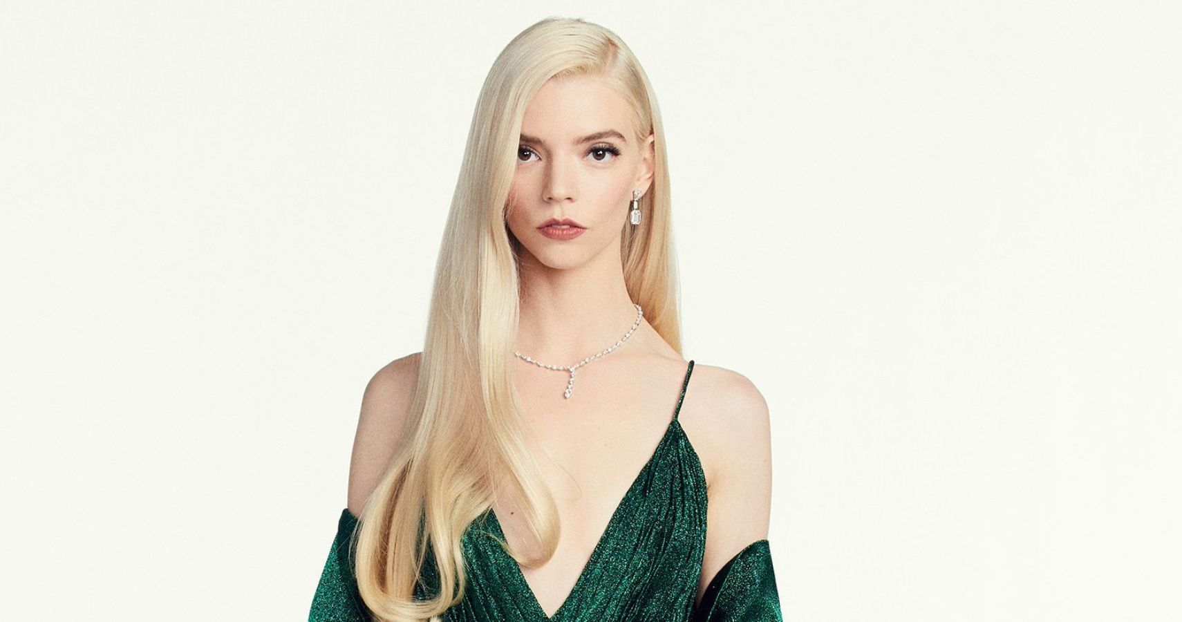 Anya Taylor-Joy wearing an emerald gown at the Golden Globes
