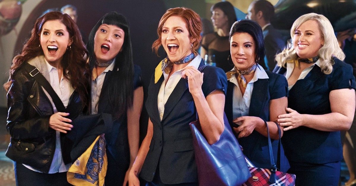Anna Kendric, Hana Mae Lee, Brittany Snow, Chrissie Fit, and Rebel Wilson smile in Pitch Perfect