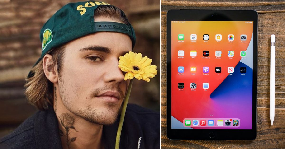 Justin Bieber holds flower over eye and iPad