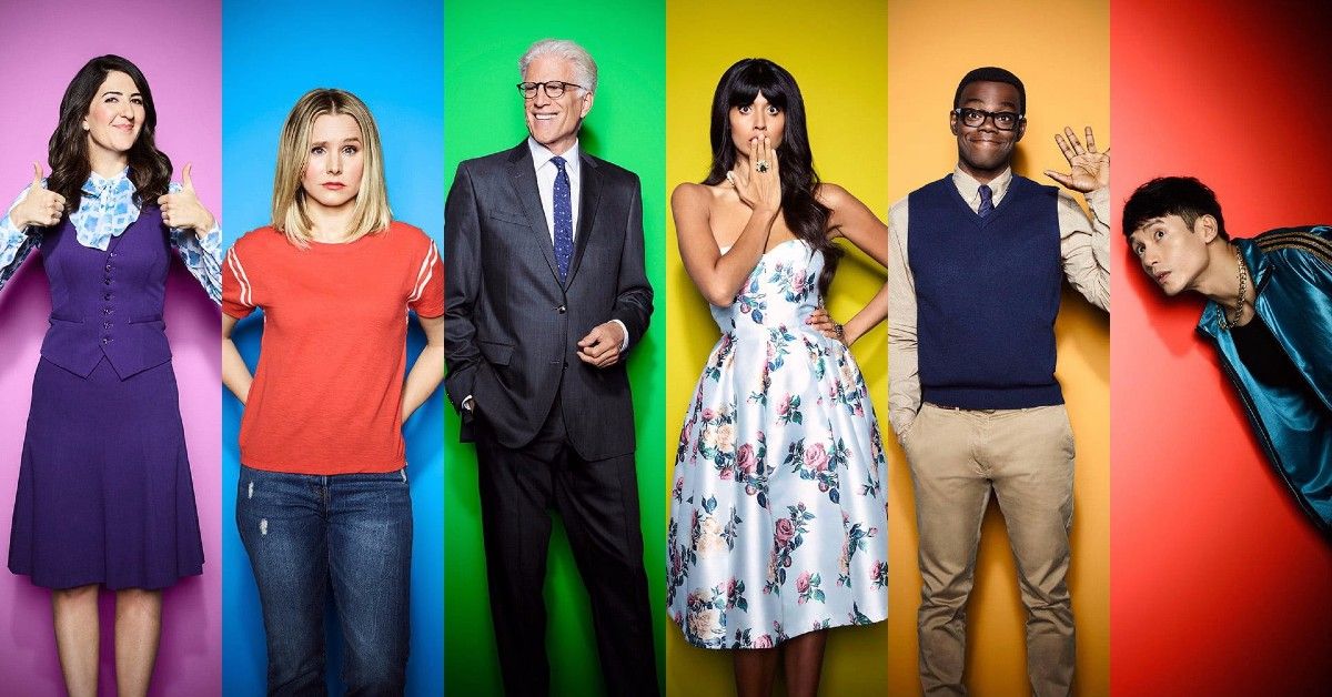 Good Place Cast in front of rainbow color background