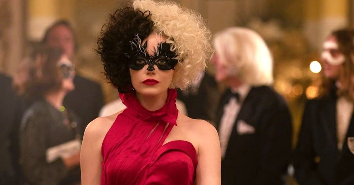 Emma Stone in red dress as Cruella De Vil