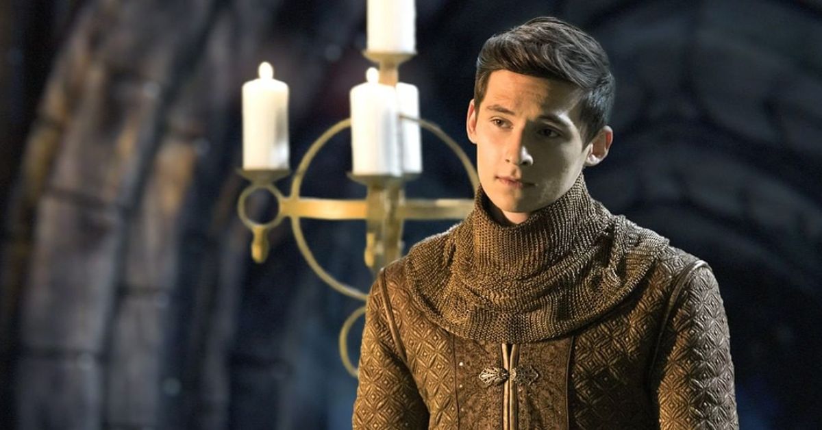 Henry standing next to a candle in Once Upon A Time.