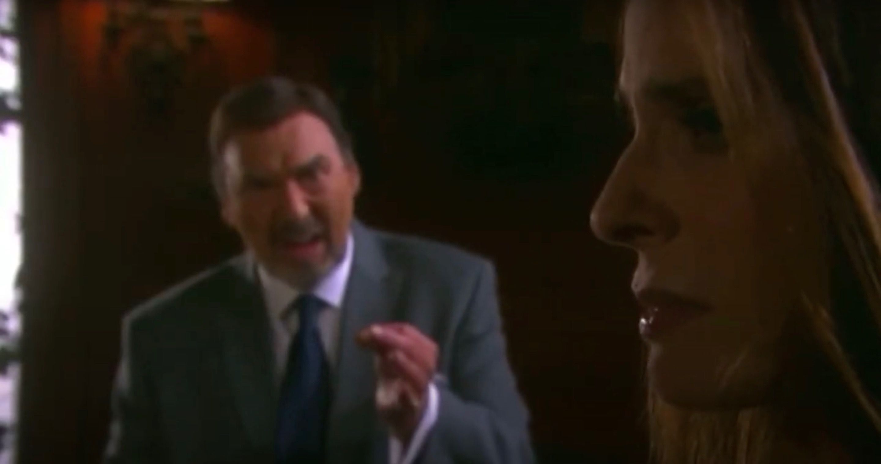 Close up of Hope and Stefano talking in the background in Days Of Our Lives.