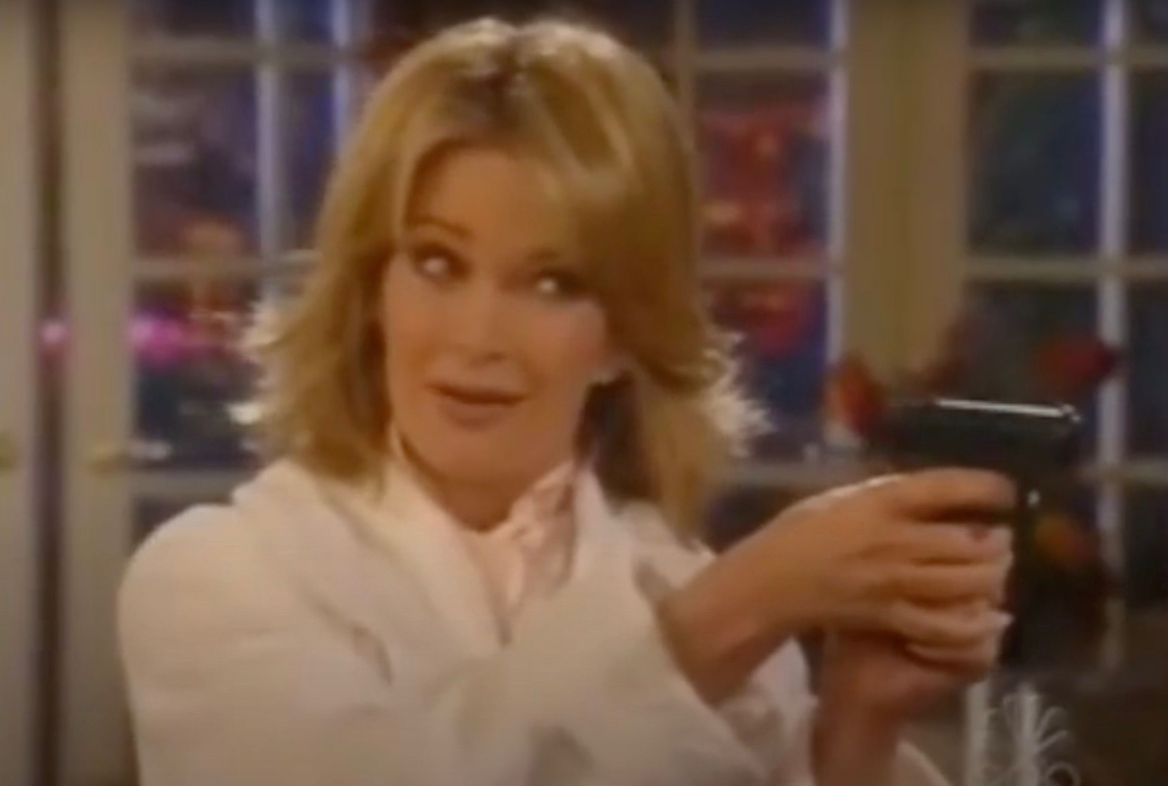 Marlena holding a gun in Days Of Our Lives.