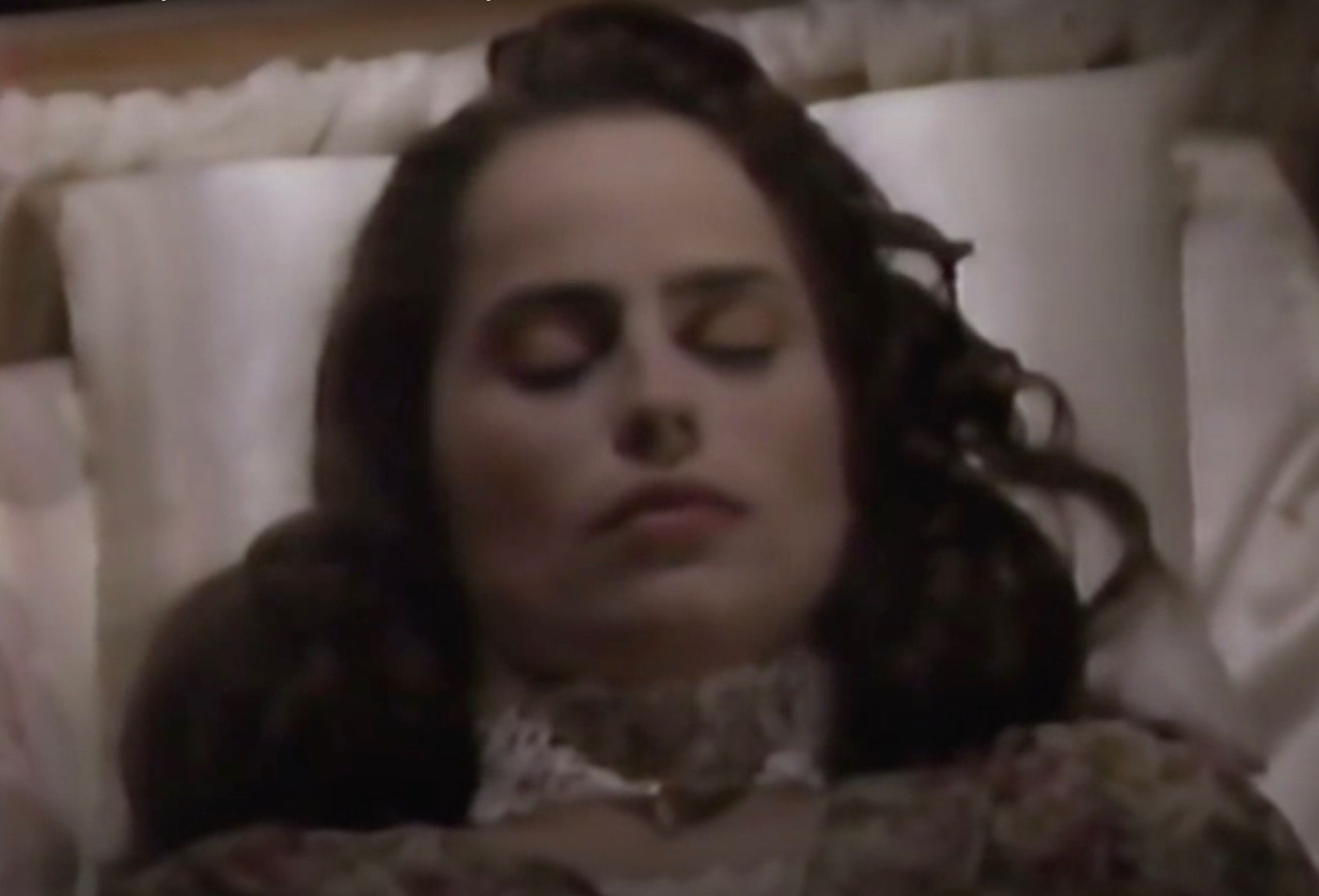 Carly pretending to be dead in a casket in Days Of Our Lives.