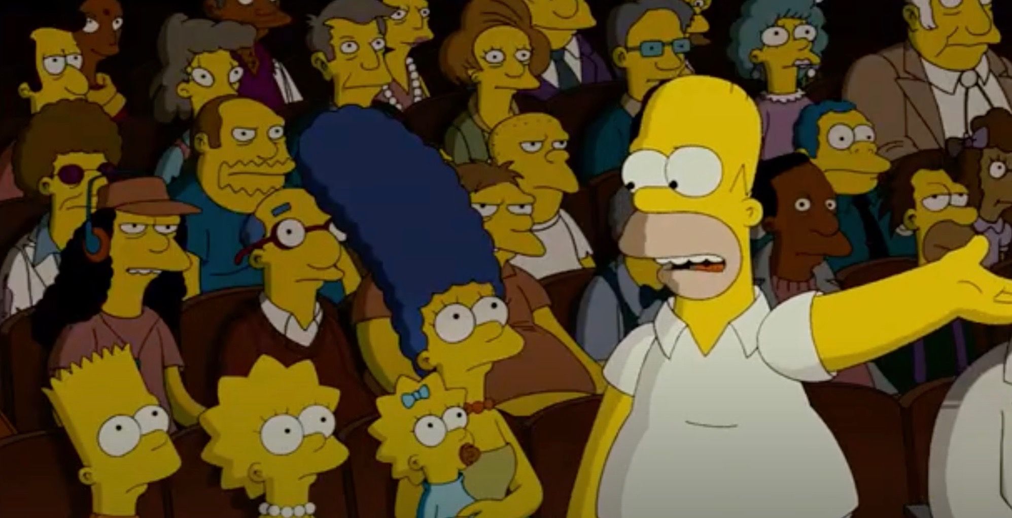 Homer talking to his family in the movie theater in The Simpsons Movie.