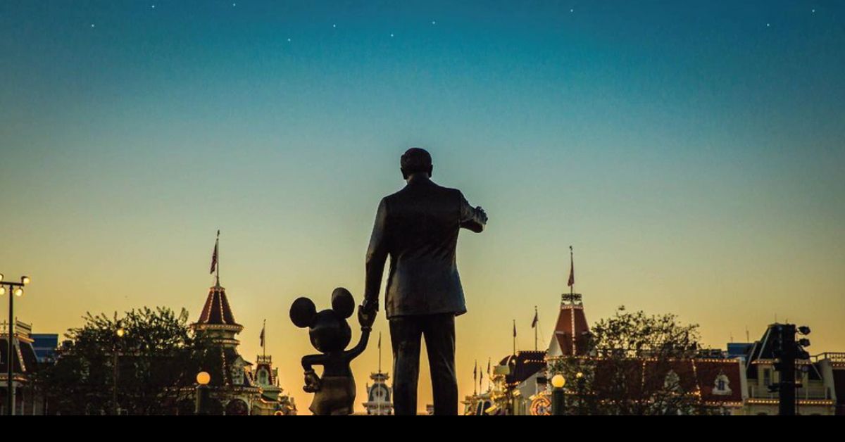 Statue of Walt Disney and Mickey at Disney World.