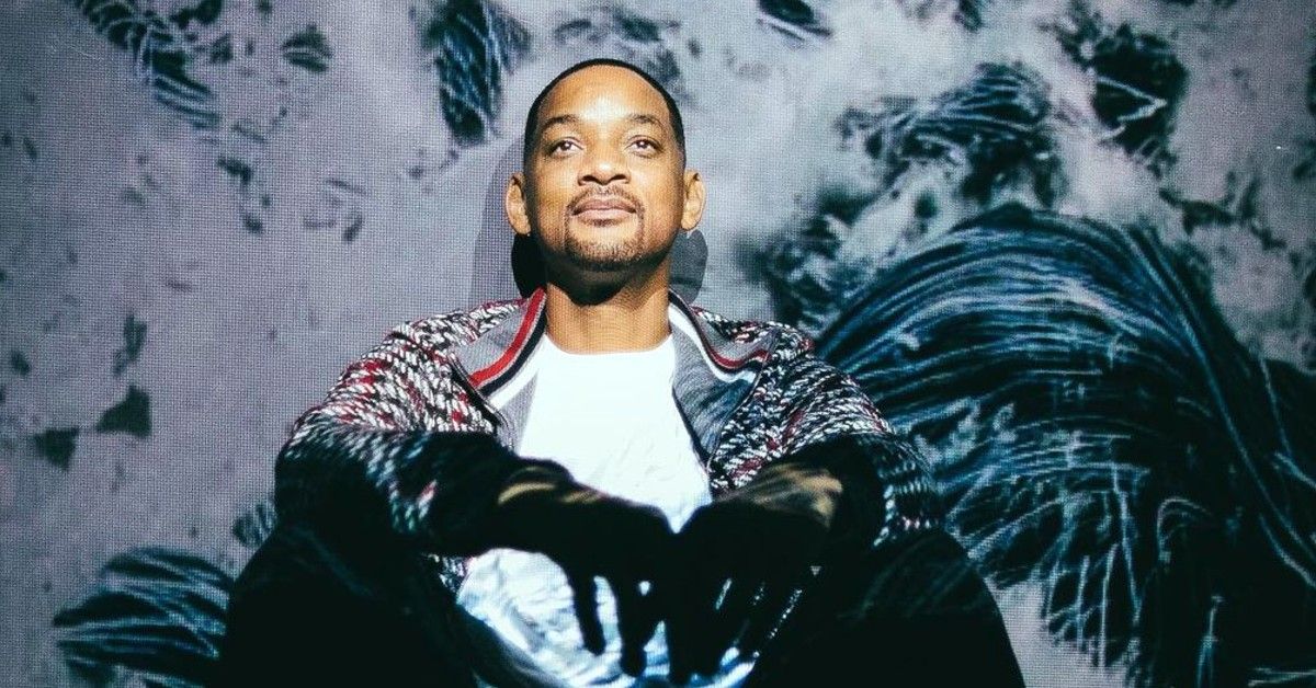 Will Smith in front of black and white background