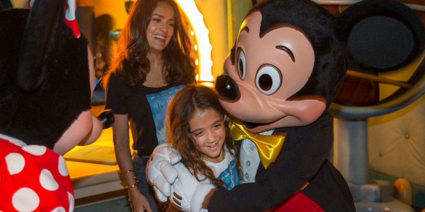 Valentina Pinault and Salma Hayek with Mickey Mouse