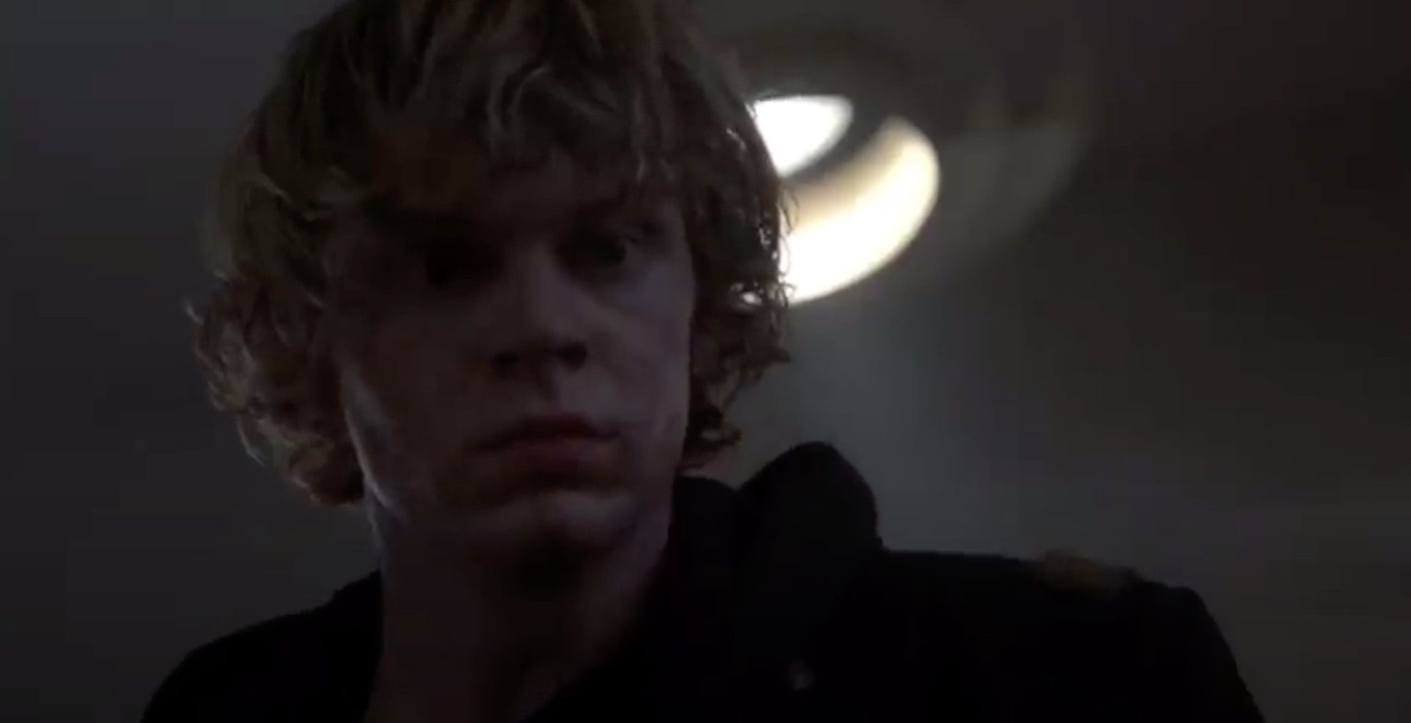 Tate shooting his classmates in American Horror Story.