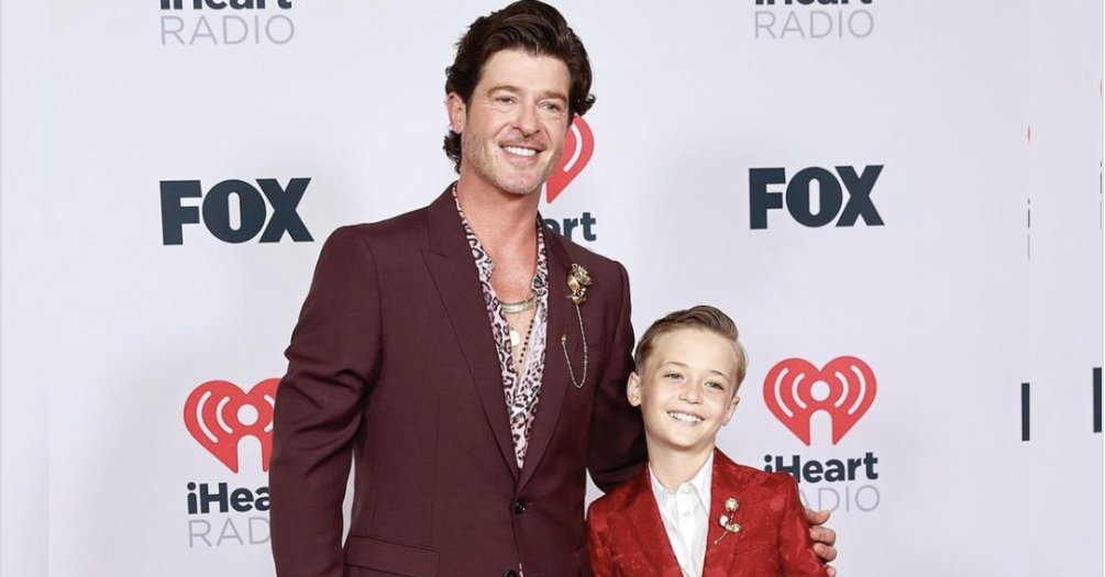 robin thicke and his son on the red carpet