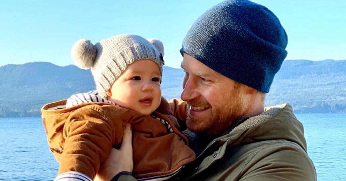 Prince Harry Smiling and Holding Son Baby Archie.