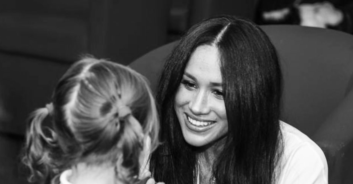 meghan markle looking at her daughter