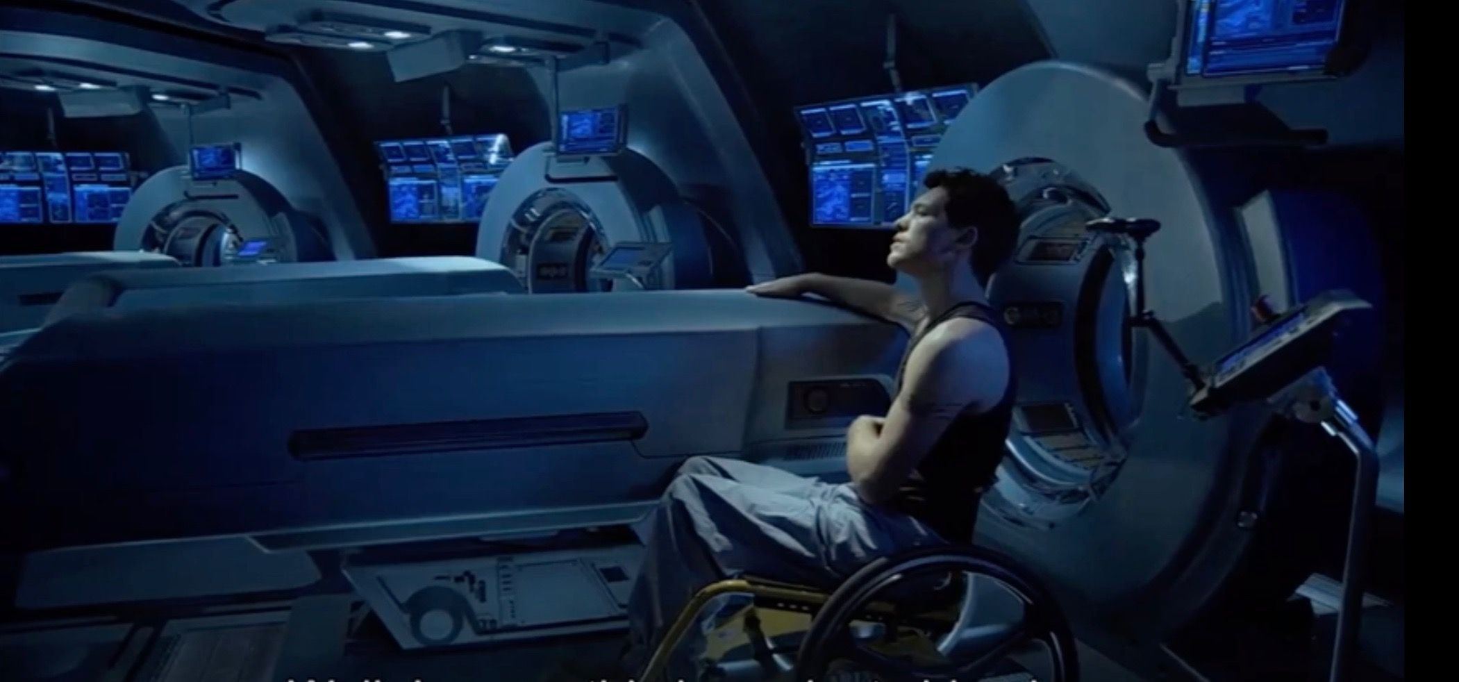 Sam Worthington in a wheelchair in the avatar lab in Avatar.
