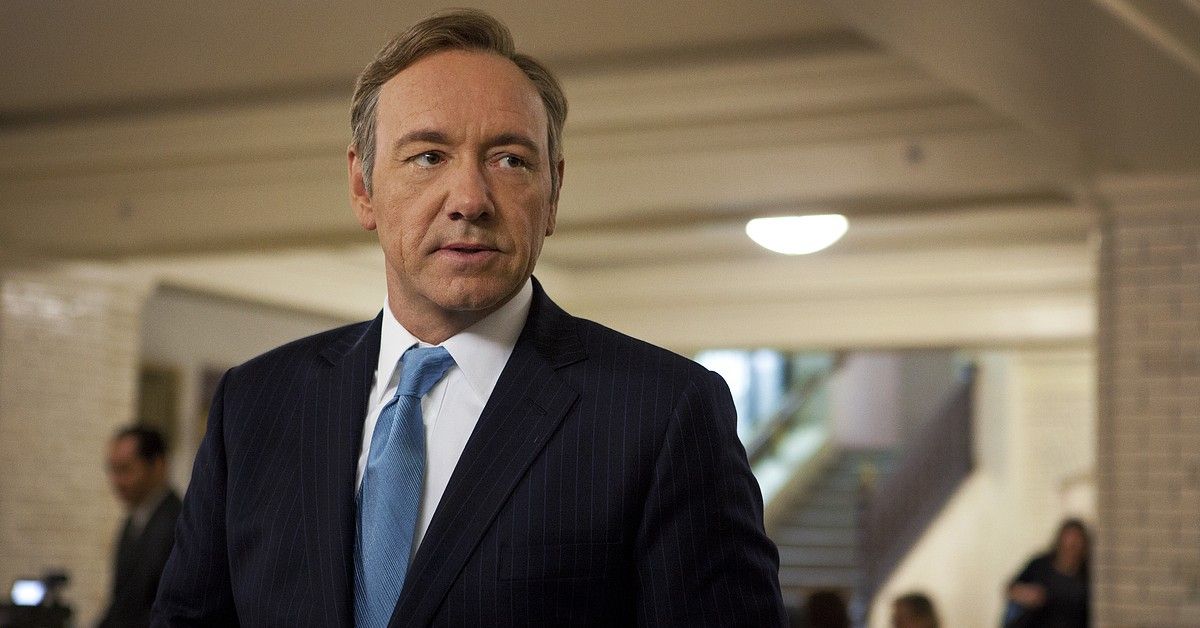 Kevin Spacey in suit with blue tie