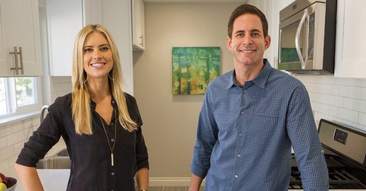 Christina Haack and Tarek El Moussa standing next to each other in kitchen