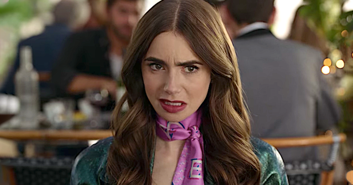 Lily Collins looks worried as 'Emily Cooper' in 'Emily in Paris' wears a pink silk scarf.